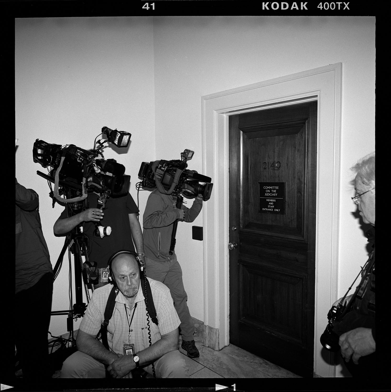 Media at the Republican members and staff entrance to the House Judiciary Committee room during hearings on Russian interference. Capitol Hill, Washington, DC, 2019.