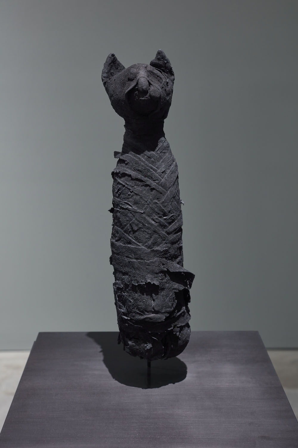 Cat Mummy. Ash-infused polymer, 16 × 3.5 × 3.5 in.