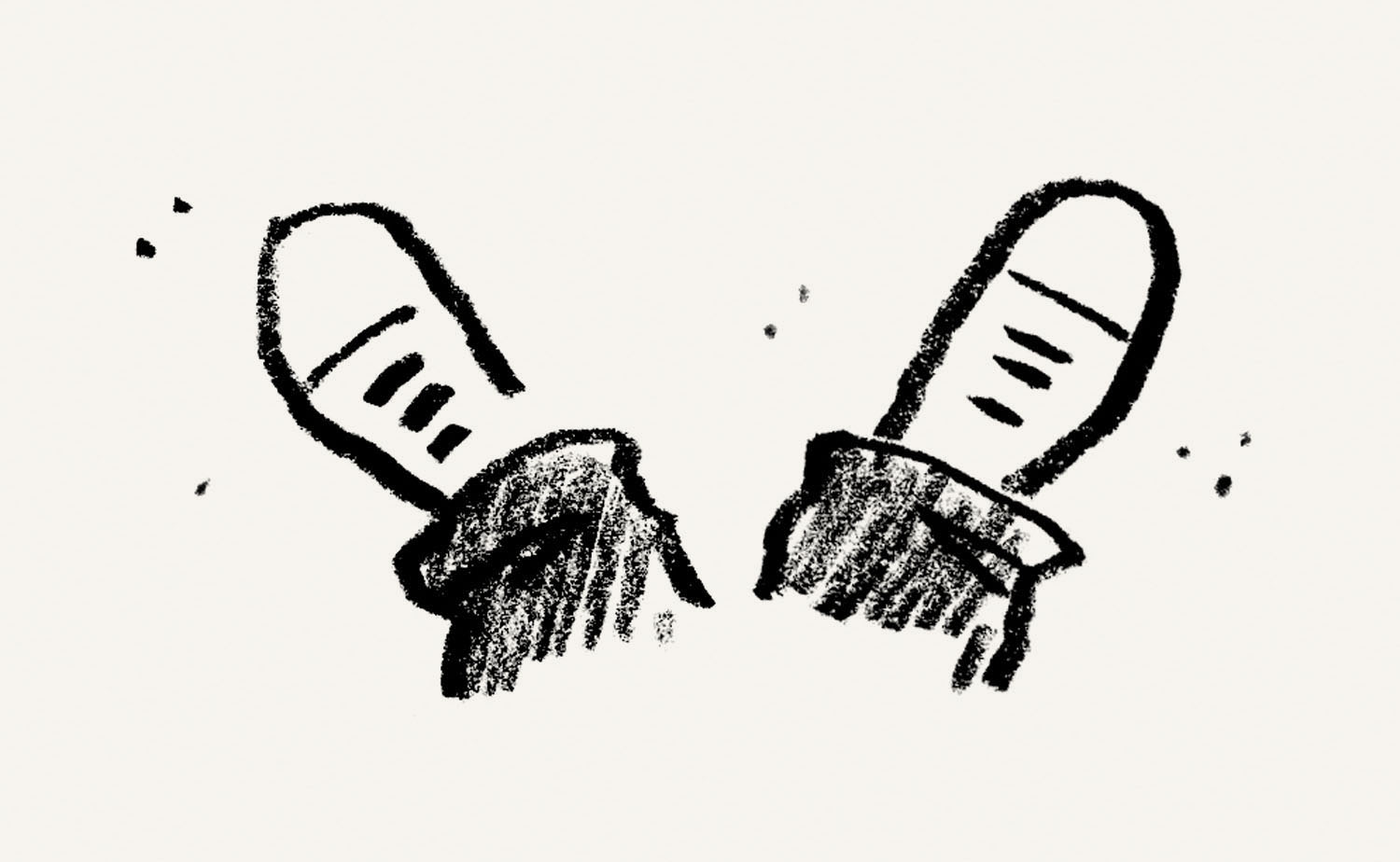 Pair of upturned legs, with only pants cuffs and shoes shown.