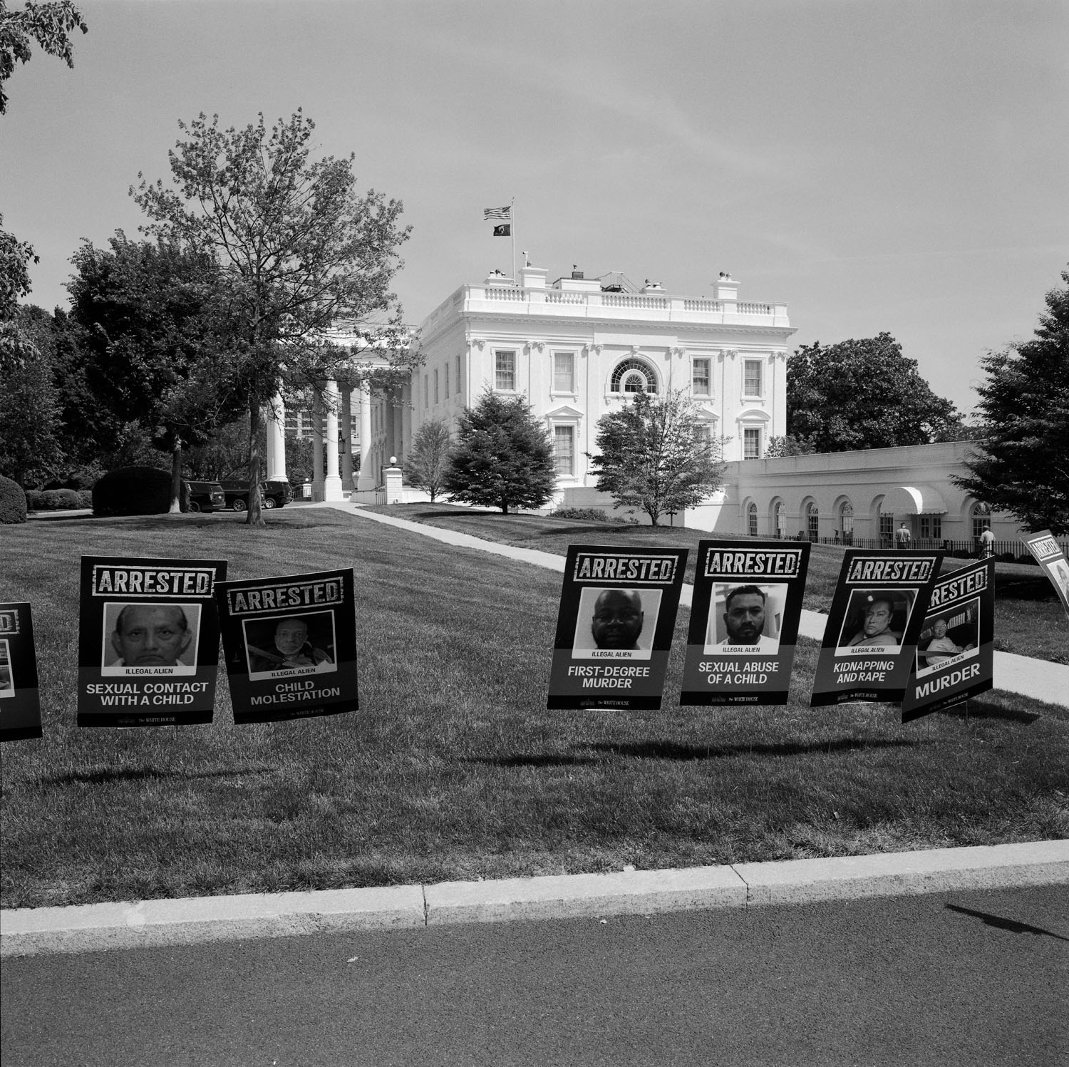 Signs on lawn.