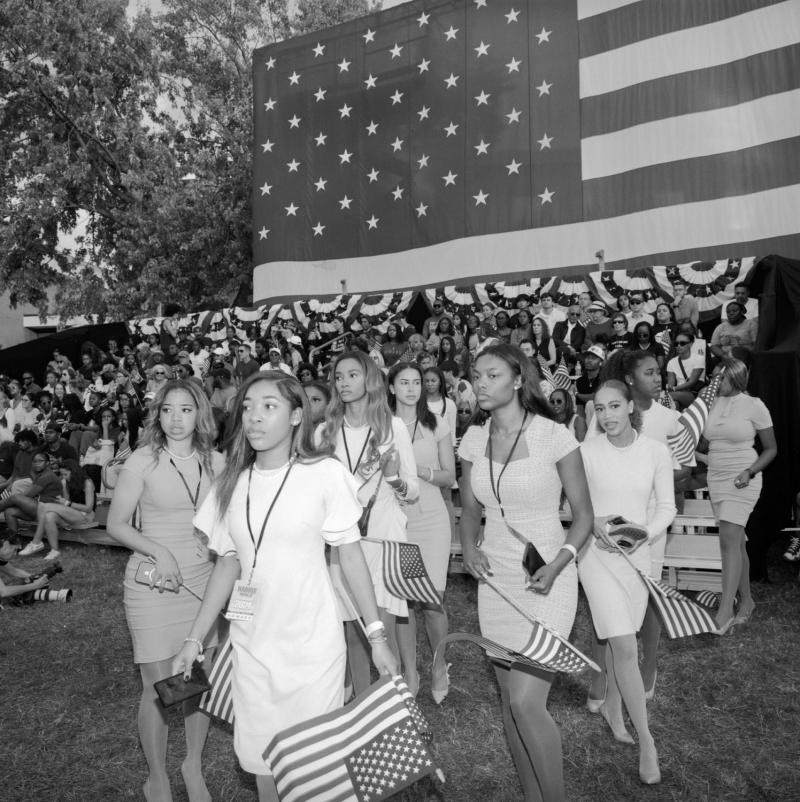 Women with American flags.