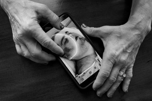 Image of boy on phone.
