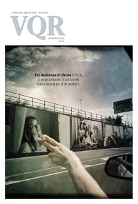 Cover photo by Lynn Johnson. Portraits of women of Librino as public art installation on side of a roadway. Cover photo by Lynn Johnson.